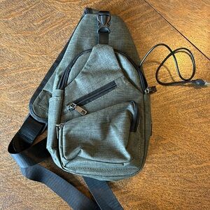 Crossbody with charging port NuPouch